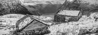 9814353/snowcovered-cabins-above-geirangerfjord-shutterstock-2191627955_1738764830064.jpg