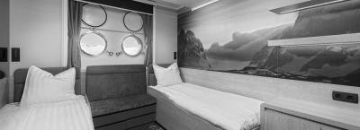 9821635/hondius-twin-porthole-cabin-01jpg-ivan-ivanisevic_1752224122244.jpeg