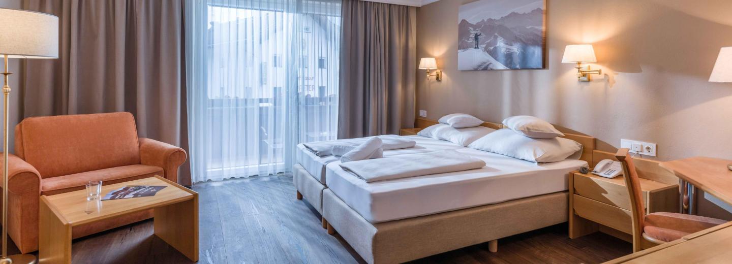 Zimmerbeispiel, Dreibettzimmer Balkon Spieljoch