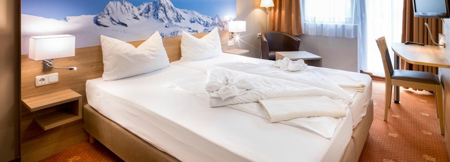 Zimmerbeispiel: Doppelzimmer Standard Balkon Nebenhaus Haus Figol