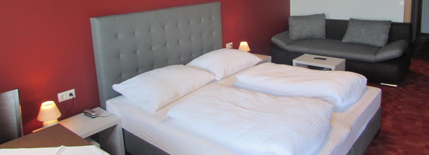 Zimmerbeispiel: Dreibettzimmer Balkon