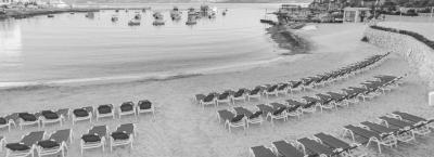 9836297/ramla-bay-resort-sandy-beach-deckchairs_1774363667005.jpg